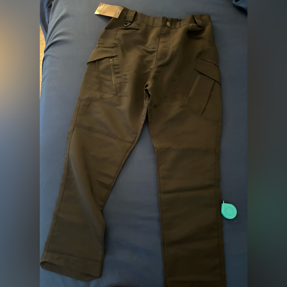 Men’s black tactical pants, size large.